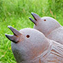 Sculpture d'oiseaux chanteurs en terre cuite